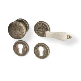 Rozetna kvaka CERAN / brončana patina - bijeli porculan