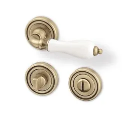 Rozetna kvaka CERAN / Starozlatna - bijeli porculan