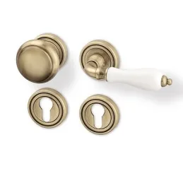 Rozetna kvaka CERAN / Starozlatna - bijeli porculan