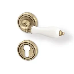 Rozetna kvaka CERAN / Starozlatna - bijeli porculan