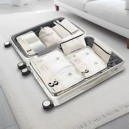 7-dijelni set za putovanja za odjeću i kozmetiku TRAVEL LUX / Bijeli