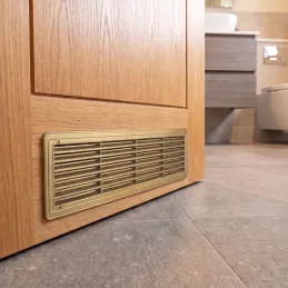 Obostrana ventilacijska rešetka za vrata 430 x 115 mm / Zlatna patina